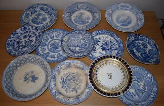 19th century blue and white transfer ware to include a Davenport armorial plate, dishes, plates