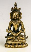 Kleine Figur eines sitzenden gekrönten Buddha Tibet, 18./19. Jh.
