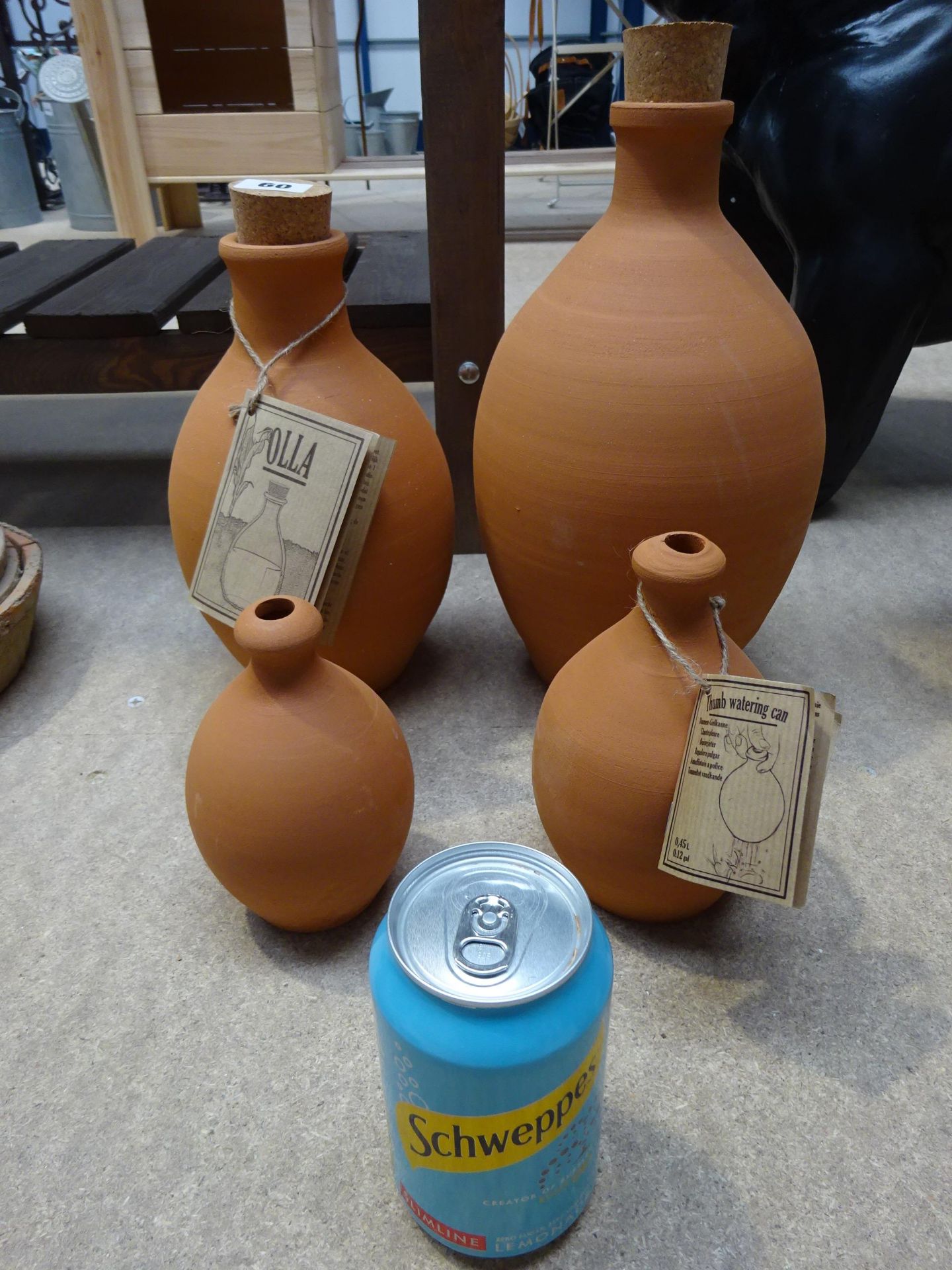 x 2 terracotta watering bottles & x 2 terracotta thumb watering cans