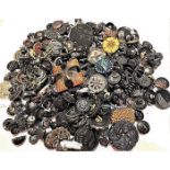 A LARGE BAG LOT OF ASSORTED BLACK GLASS BUTTONS