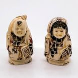 Pair of Japanese Inked Carved Bone Netsukes