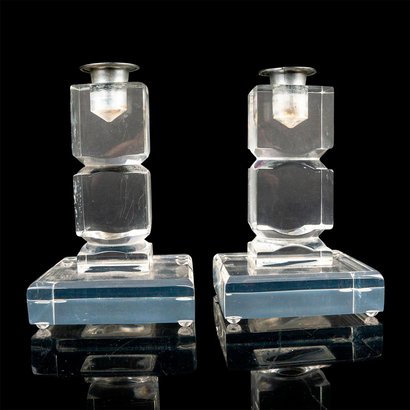 Pair of Van Teal (American, b.1976) Candle Holders