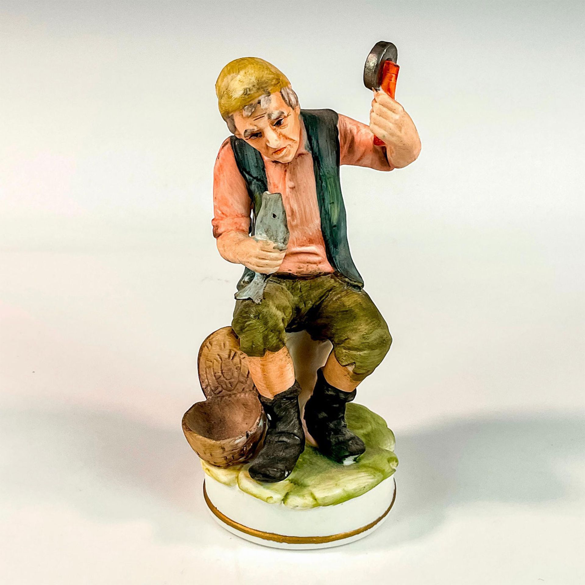 Hand-Painted Porcelain Figurine, Fisherman