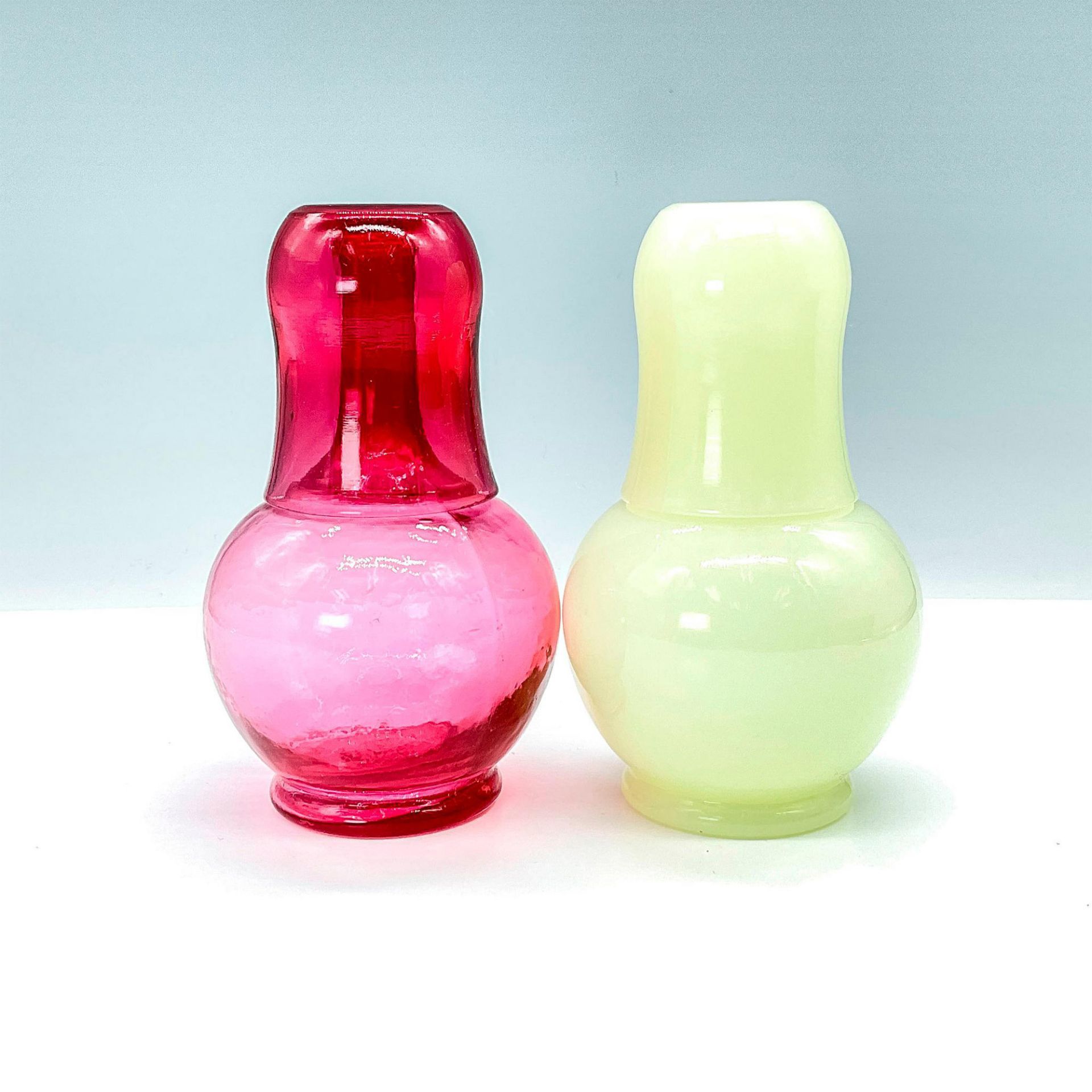 Pair of Tumble Up Water Carafes Custard and Cranberry Glass