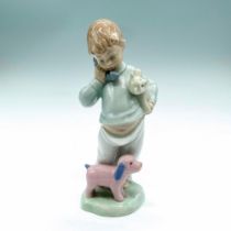 Nao By Lladro Figurine, Boy on Phone with Puppets