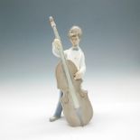 Boy With Double Bass 1004615 - Lladro Porcelain Figurine