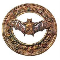 A Division One Pierced Metal Flying Animal Button