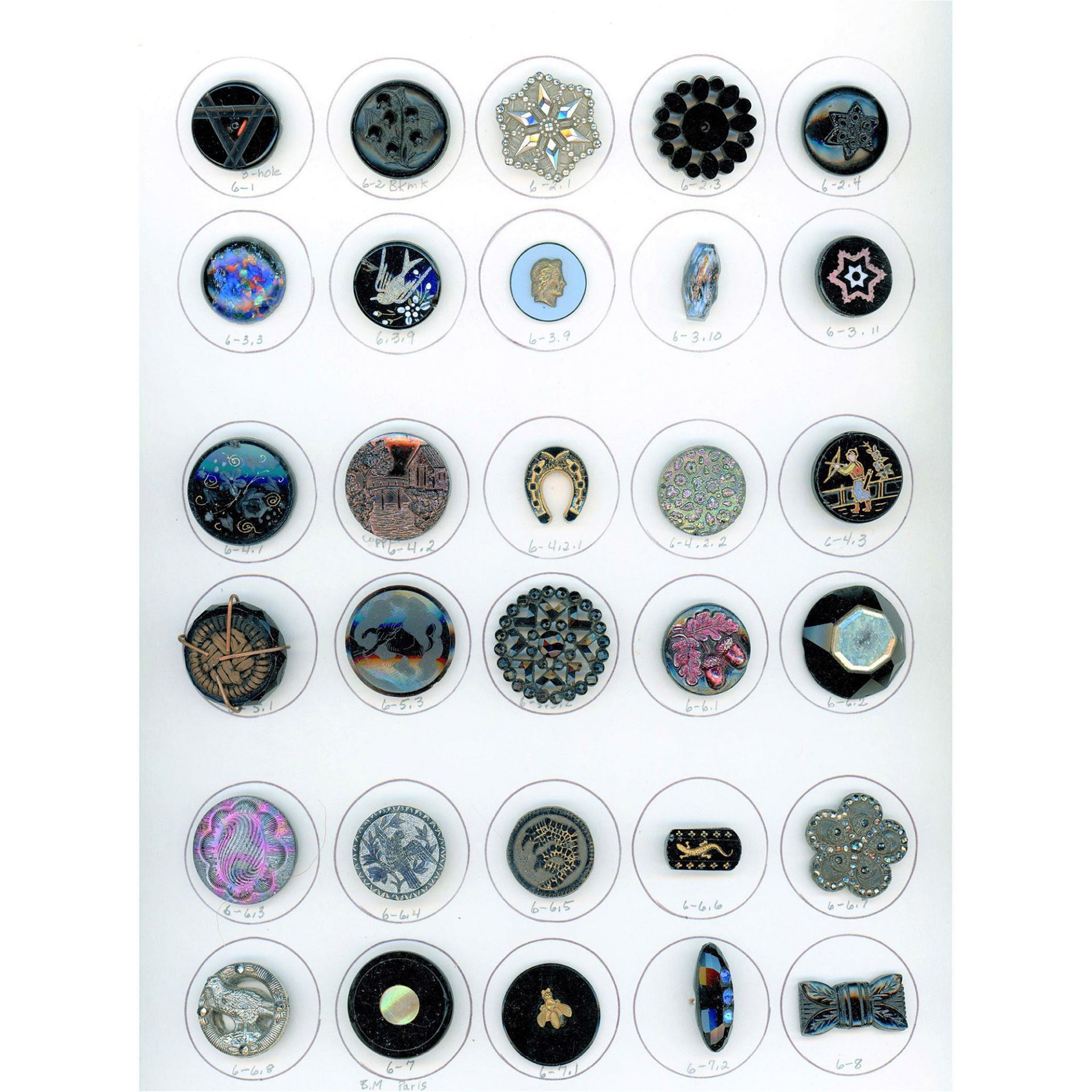 A Card of Division One Assorted Black Glass Buttons