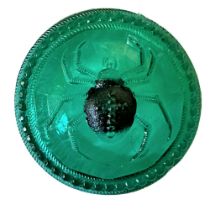 A Green Translucent Glass Animal Life Button