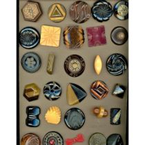 A Card of Assorted Division Three Bakelite Buttons