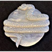 A Division Three Carved Pearl Animal Button