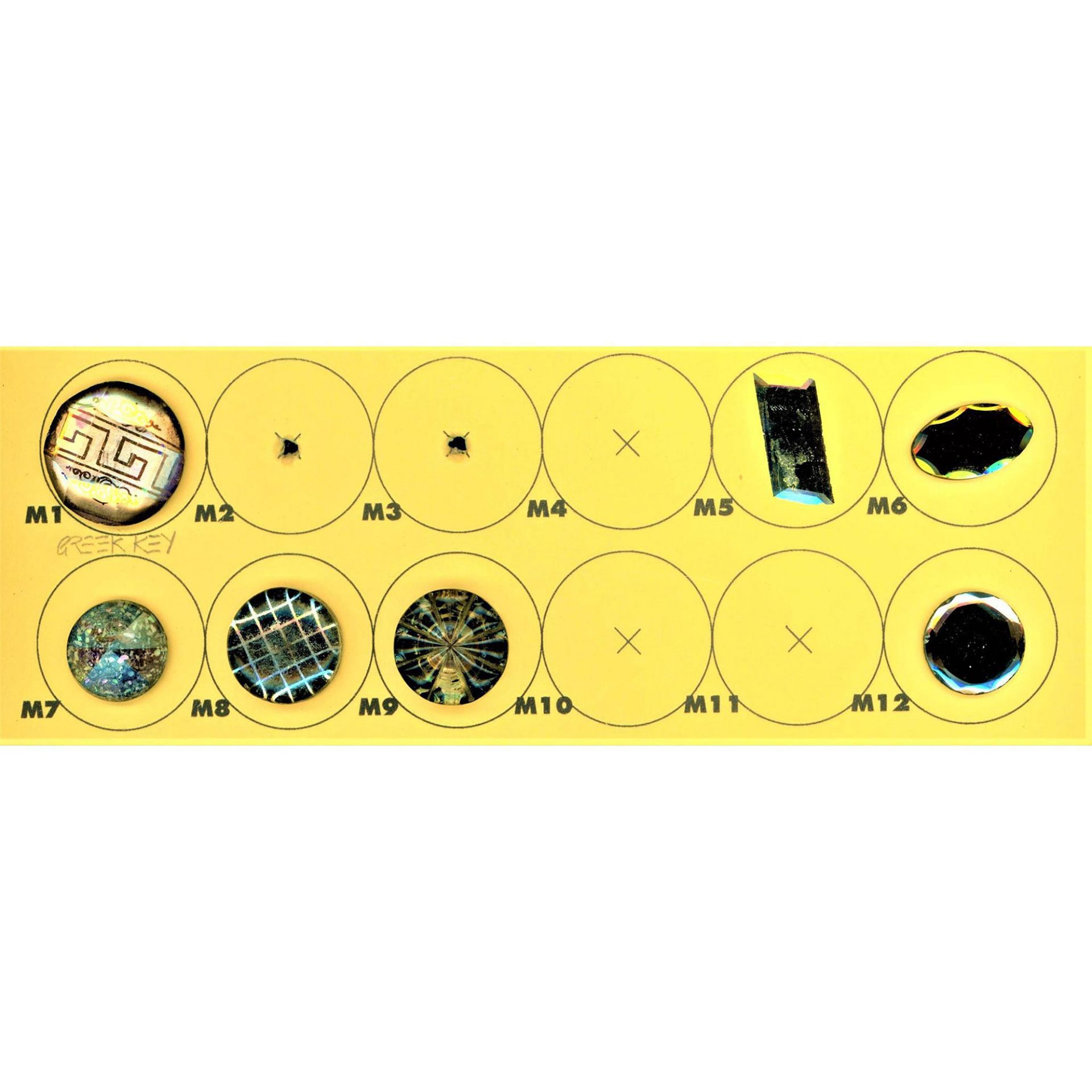 A Partial Card of Division 1 Glass Buttons