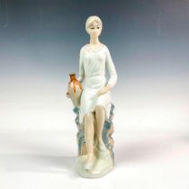 Casades Porcelain Seated Woman Figurine