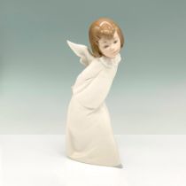 Curious Angel 1004960 - Lladro Porcelain Figurine