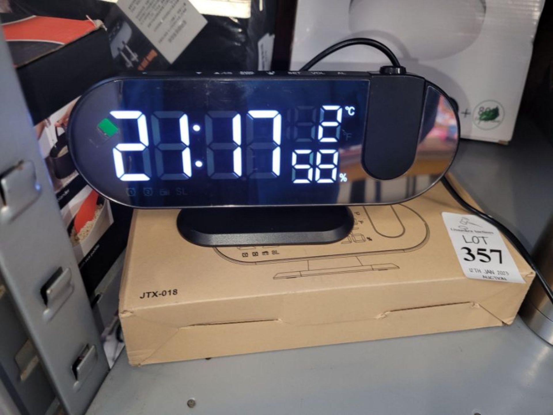 ALARM CLOCK WITH PROJECTOR LIGHT (WORKING)