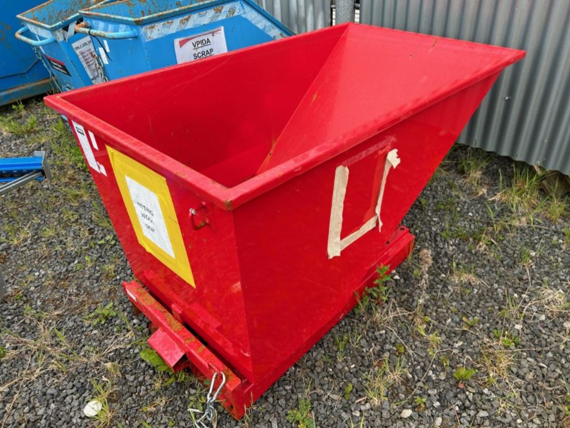 RED FORKLIFT TIPPING SKIP