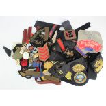 Assorted Militaria items: Arm Badges, Cap Tallys, Buttons, Cloth & Metal Badges, Arm Of Service