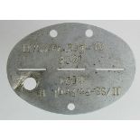 German "dog tag" for the 10th SS Panzer Division "Frundsberg". Stamped 'II/SS.Pz.Regt.10 3021'.