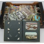 Banana Box of 1970's postcards together with an album of older postcards and RP's. (Buyer collects)