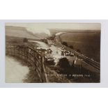 Railway station postcard. Dyke Station near Brighton Sussex, with steam train approaching, real