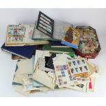 Purple plastic crate with several albums / stockbooks of general foreign stamps, incl British