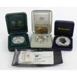 Australia Commemorative Silver Dollars (4): Kangaroo 2000 in capsule, Westminster packet and cert;