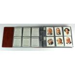 Album of large sized cigarette cards sets in sleeves, including Kings & Queens of England,
