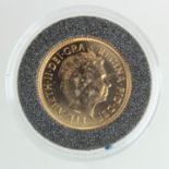 Sovereign 2002 BU in a hard plastic capsule