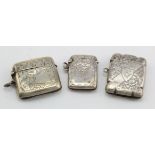 Three engraved silver vesta cases, various makers & dates. Total weight of three items is 2.25oz