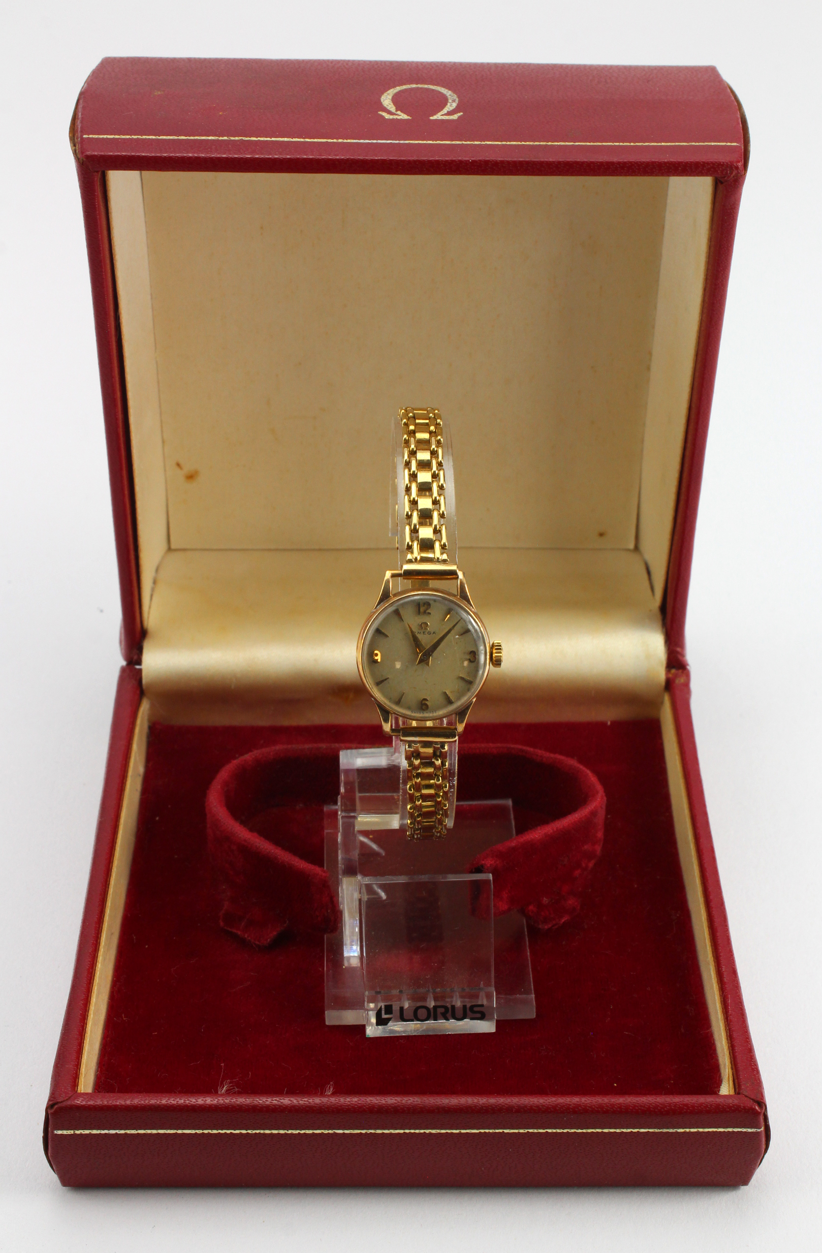 Ladies 9ct cased Omega manual wind wristwatch on a 18ct non Omega bracelet. Total weight 19g. In