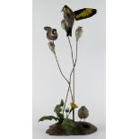 Mike Wood. A carved wood & metal sculpture by Mike wood, titled to base 'Goldfinch' (1/2000),