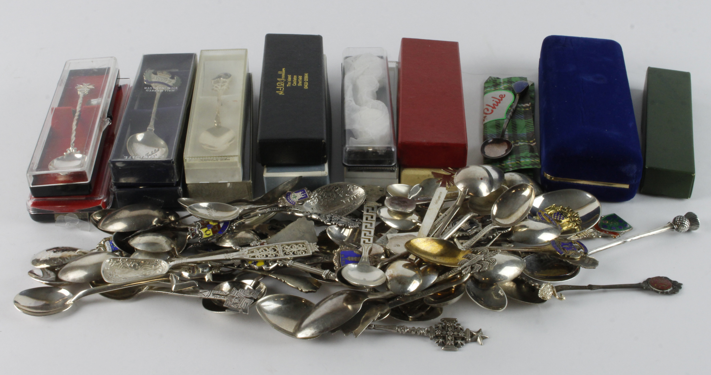 Teaspoons. A large collection of over seventy silver & white metal teaspoons (mostly souvenir),