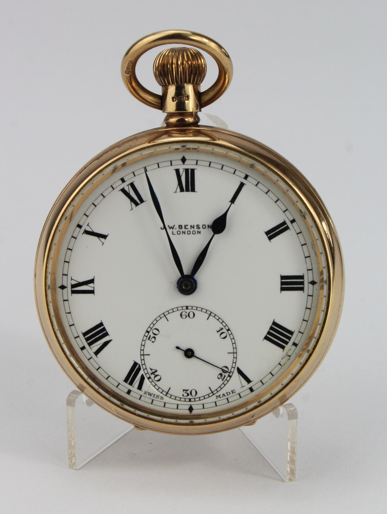 Gents 9ct open face pocket watch by Benson. Hallmarked Birmingham 1930. The white dial with black