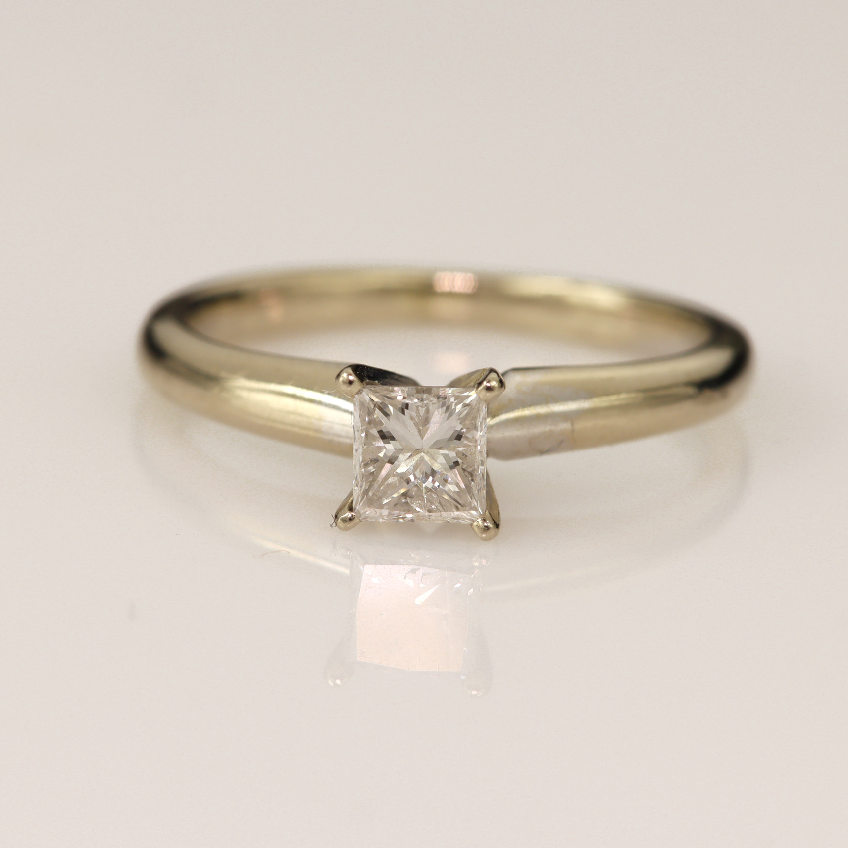 White gold (tests 14ct) diamond solitaire ring, princess cut approx 0.39ct, estimated colour