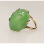 Yellow gold (tests 9ct) jade solitaire ring, one oval cabochon cut jadeite jade measures 17.7mm x