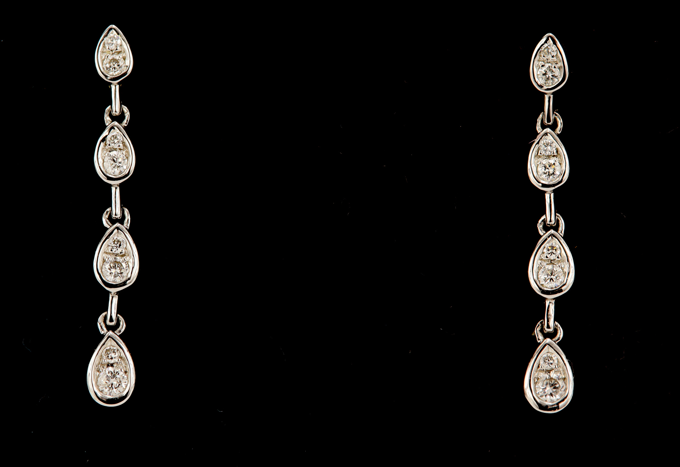 18ct white gold diamond drop earrings, four graduating pear drops each set with two round