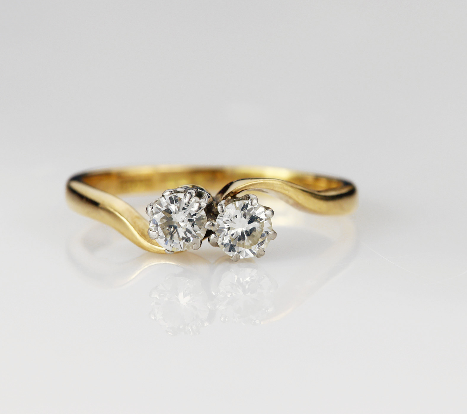 Yellow gold (tests 18ct) vintage Toi Et Moi ring, set with two round brilliant cut diamonds approx