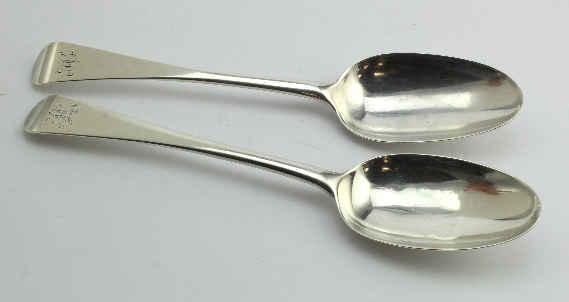 Two old English pattern tablespoons, one has a rat-tail on the bowl & is hallmarked for London