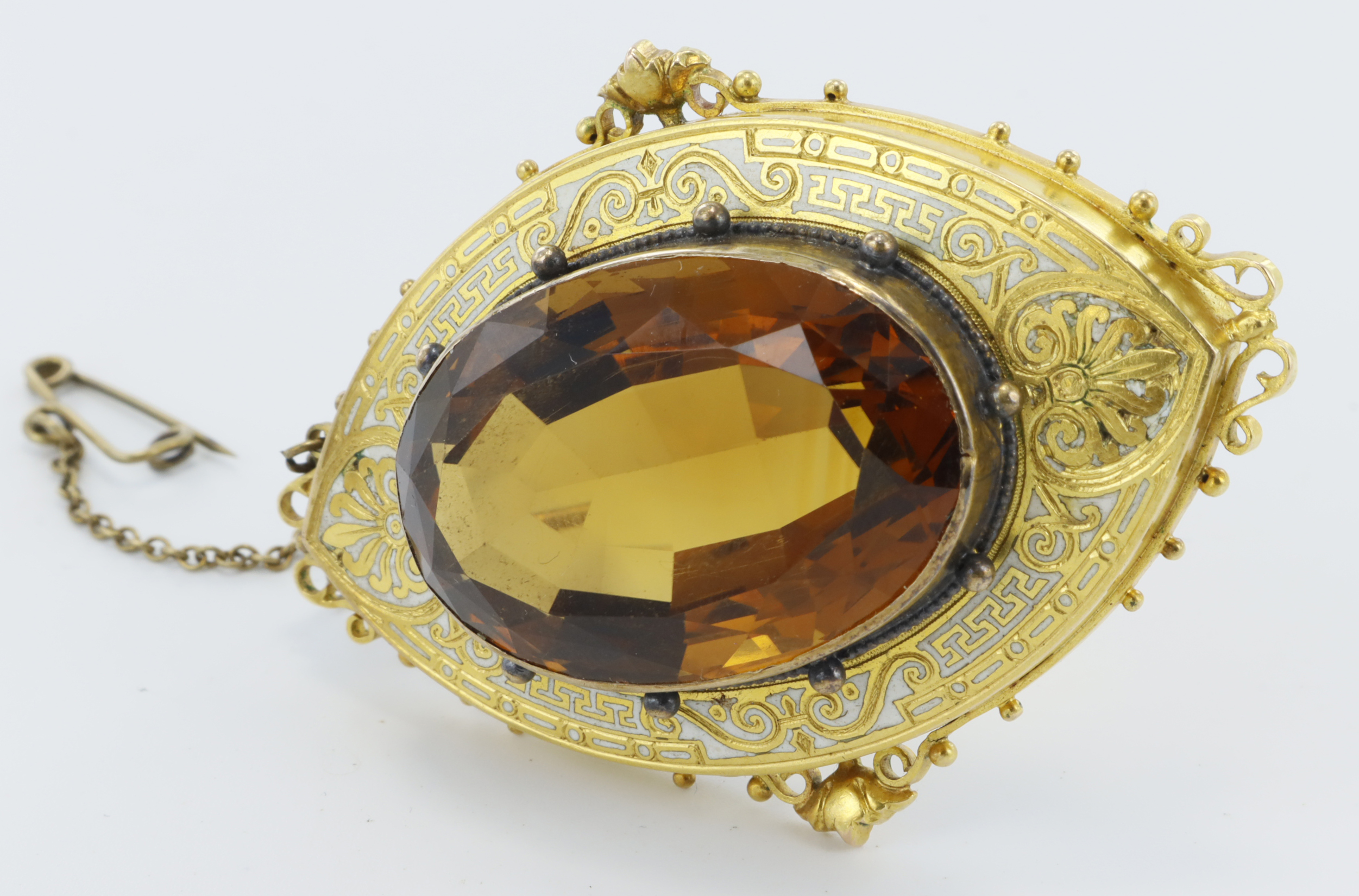 Yellow gold (tests 18ct) Victorian brooch, set with one oval mixed cut golden citrine weight