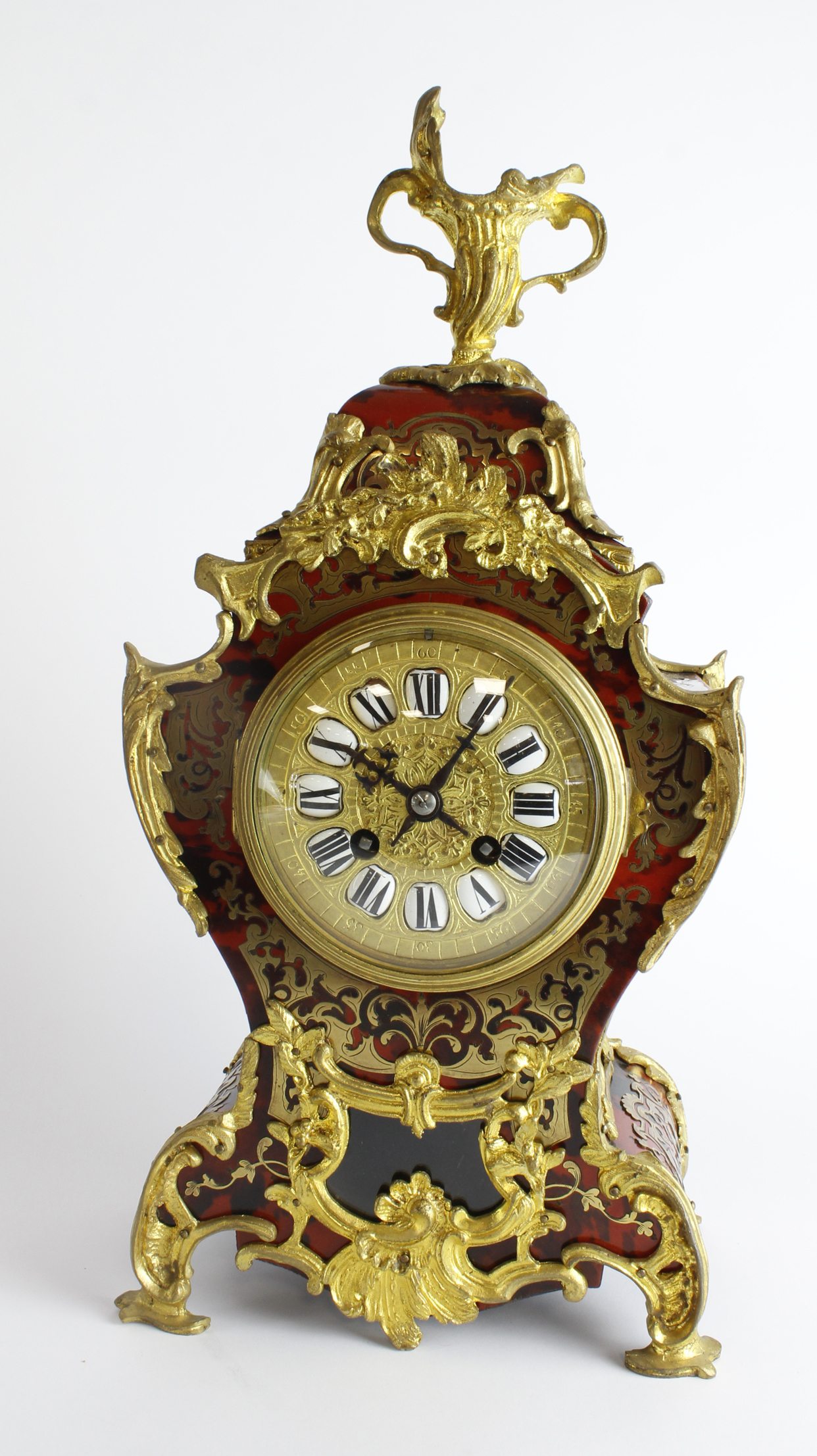 Gilt boulle ormolu mantel clock, with French Movement marked 'B', gilt dial with enamel Roman