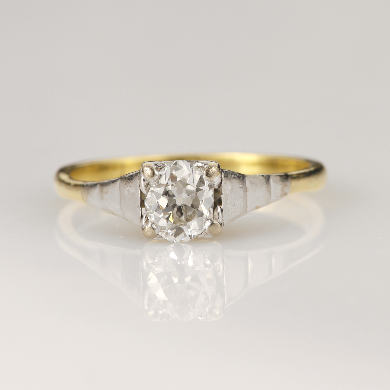 Yellow gold (tests 18ct) diamond solitaire, set with one oval old mine cut diamond approx 0.51ct,