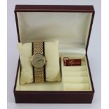 Gents 9ct cased Geneve quartz wristwatch. On a 9ct integral bracelet. Total weight 33g. In