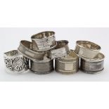 Eight silver napkin rings all have various British hallmarks including one Victorian which is