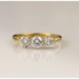 18ct yellow gold trilogy ring, set with three round brilliant cut diamonds, principle stone approx