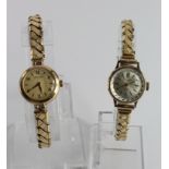 Two 9ct cased ladies manual wind wristwatches. Both working and on expandable bracelets