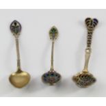 Teaspoons. Three Plique A Jour silver teaspoons, with intricate colour enamel decoration