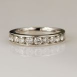 18ct white gold diamond eternity ring, set with eleven round brilliant cut diamonds total weight