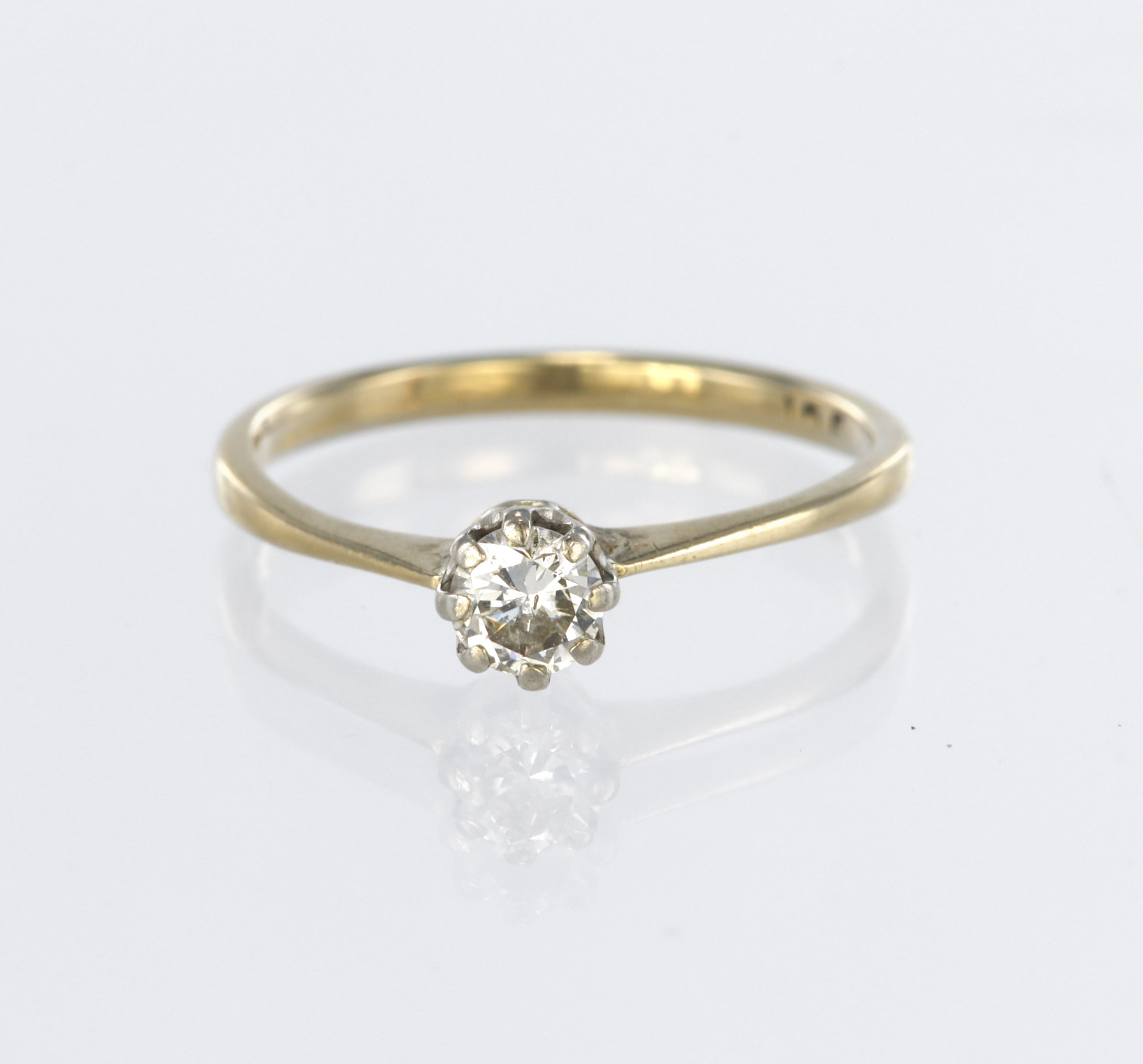 18ct yellow gold solitaire ring set with a single round brilliant cut diamond weighing approx. 0.