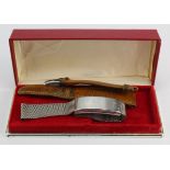 Omega. Two Omega wristwatch straps, comprising a stainless steel example (1120/116, no. 27) & a