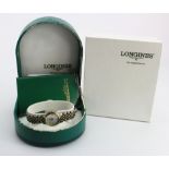 Ladies Longines "Les Grandes Classique" quartz wristwatch circa 1994. The white round dial with